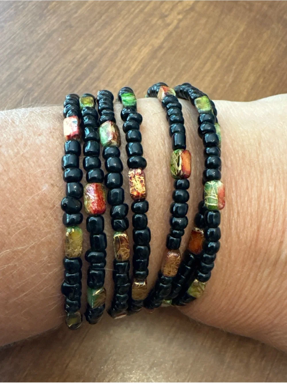 Handcrafted Black Beaded Coil Bracelet with Multicolor Accent Beads
